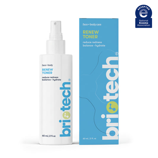 A white spray bottle labeled Renew Toner stands beside its matching blue and white box, both displaying "reduce redness, balance, hydrate"—a facial mist for calm and healthy-looking skin with simple, modern branding.