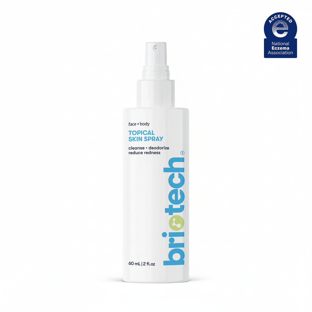 A 60 mL (2 fl oz) white spray bottle of Topical Skin Spray for face and body. The label highlights cleanse, deodorize, and reduce redness. This soothing spray helps calm irritation and refresh your skin.