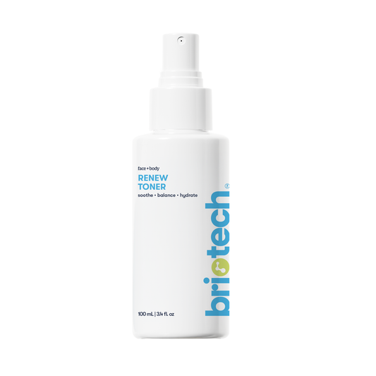 A white 100 mL (3.4 fl. oz) spray bottle labeled Renew Toner with blue and green text; this facial mist helps calm redness and reduce blemishes on face and body.