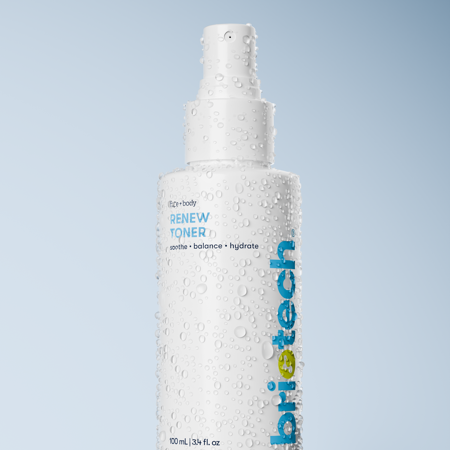A white Renew Toner spray bottle covered in water droplets sits against a light blue gradient background—ideal as a refreshing mist to calm redness and reduce blemishes.